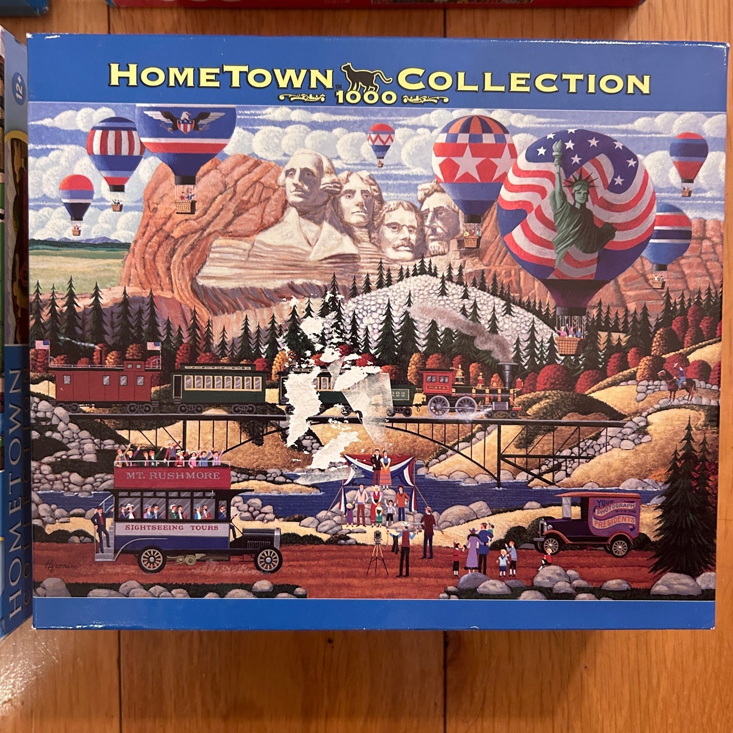 Lot of 4 Hometown Collection and Charles Wysocki 1000 Pieces Puzzles